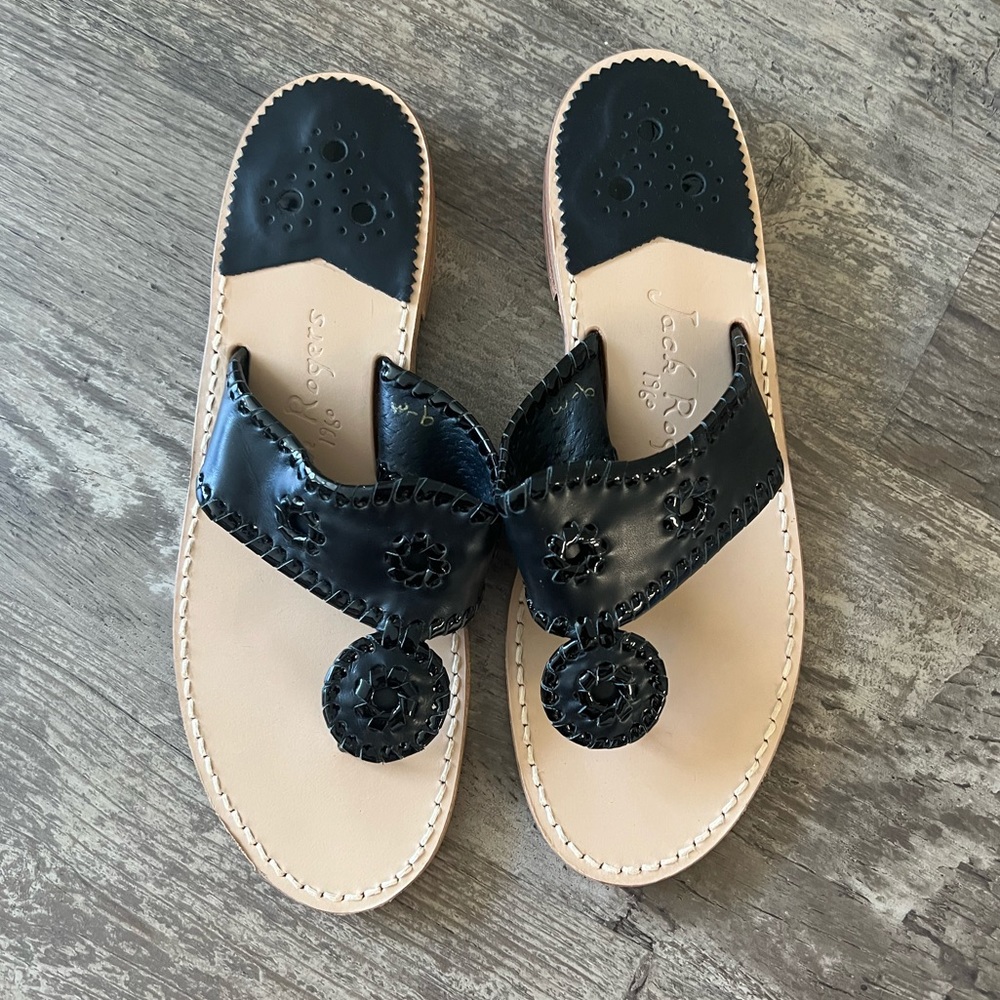 Size 9 black Jack Rodgers flip flop